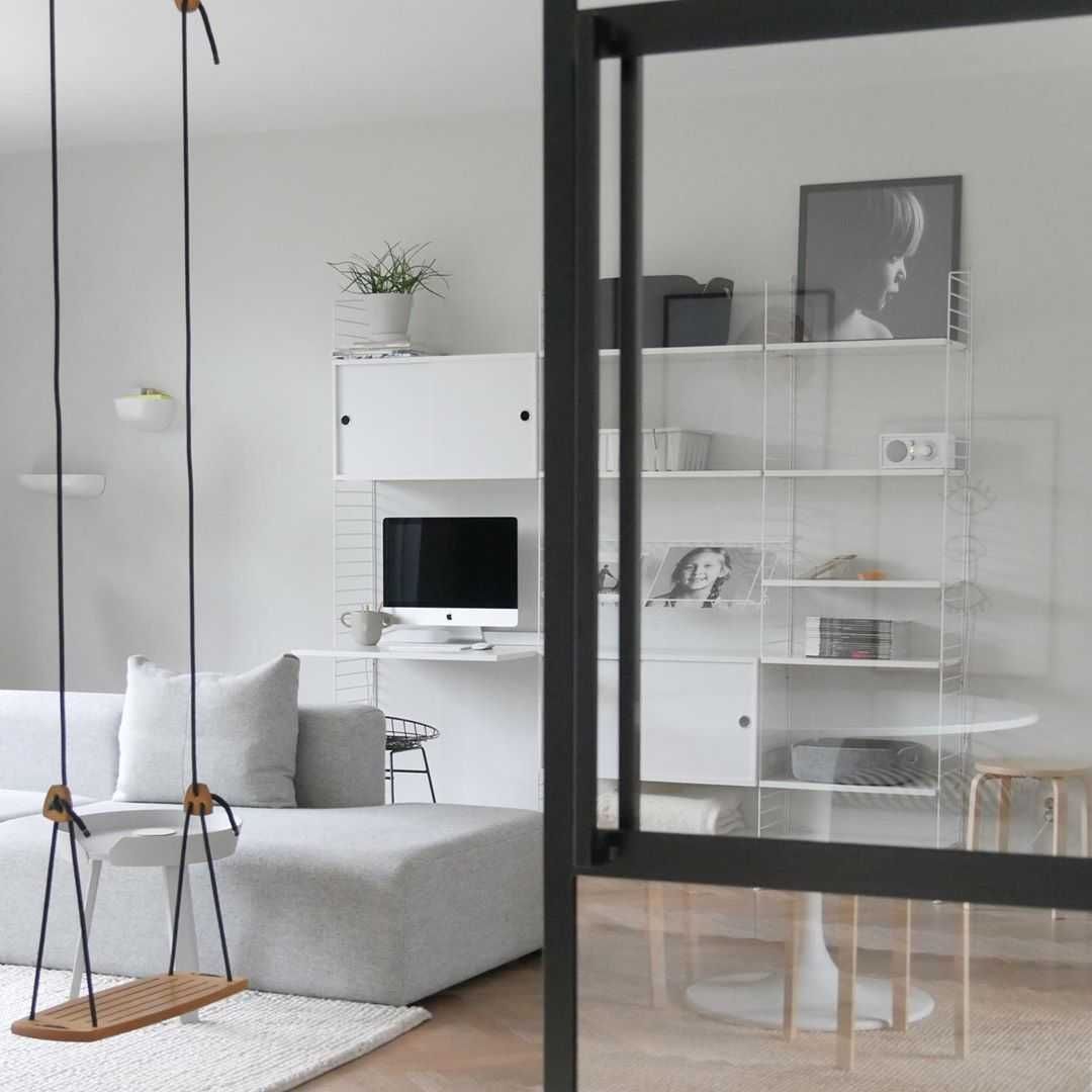 Woonkamer Woonkamer inspiratiefoto met String Furniture Kasten